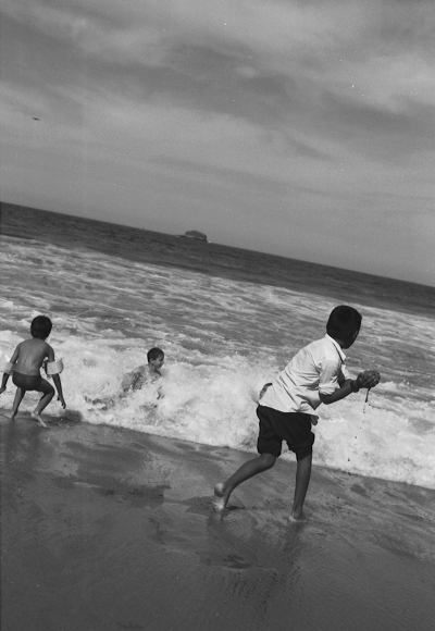 
Boys Playing in Surf
